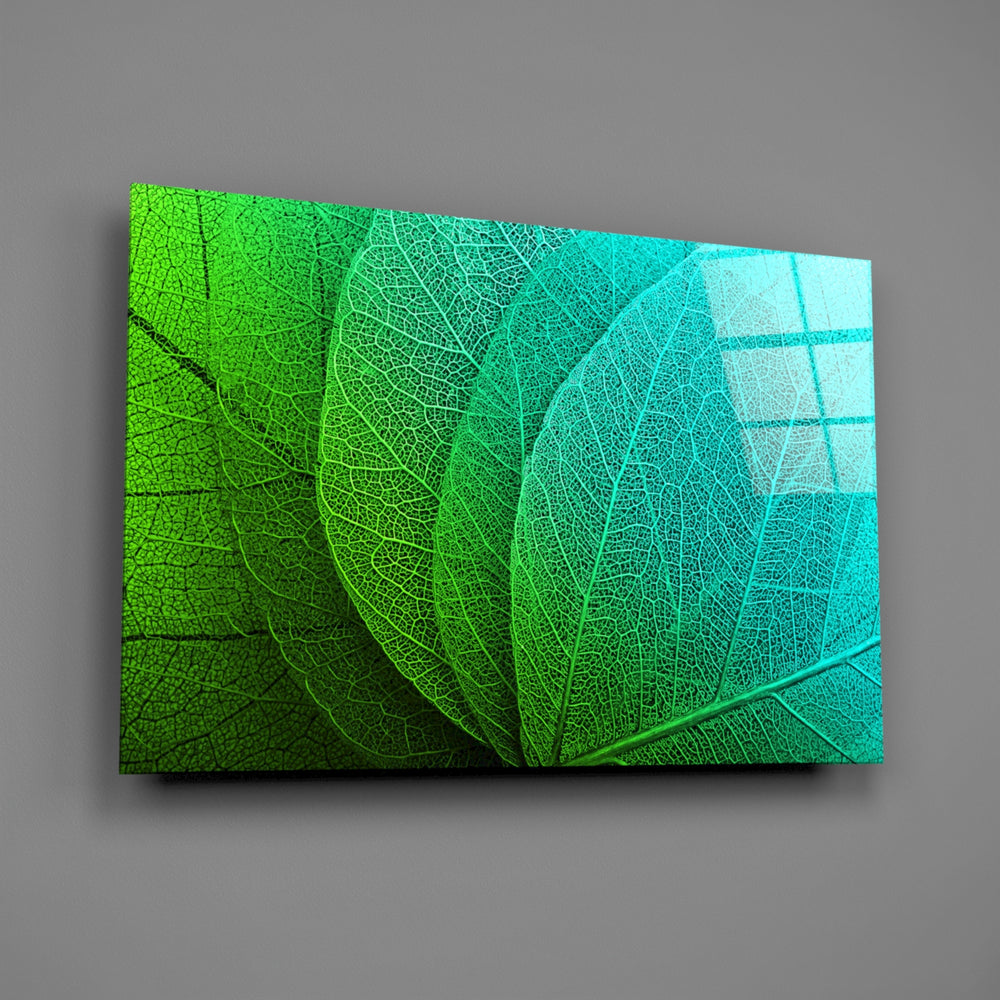Emerald-and-turquoise leaf panel bringing biophilic energy to a contemporary living space