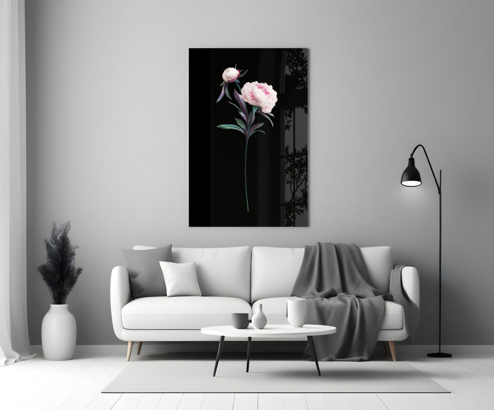 Close-up detail of the pink peony bloom and bud on dark ground