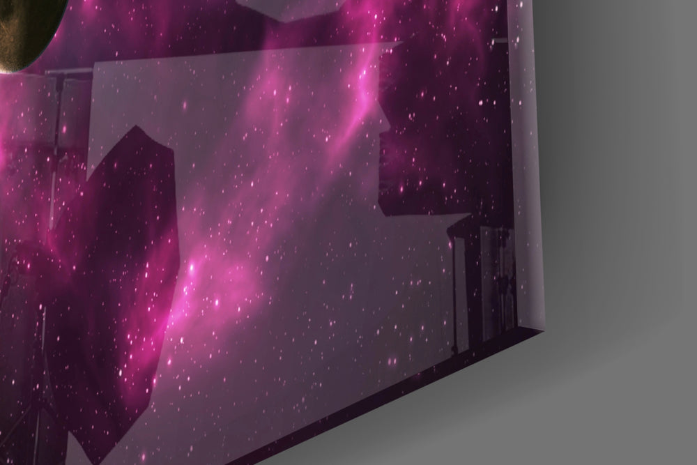 Space artwork anchoring a sci-fi-themed wall in moody palette