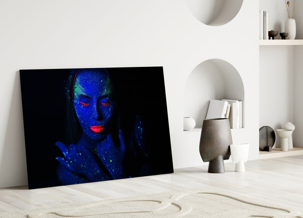Close-up detail of cobalt skin with scarlet lashes and red lips
