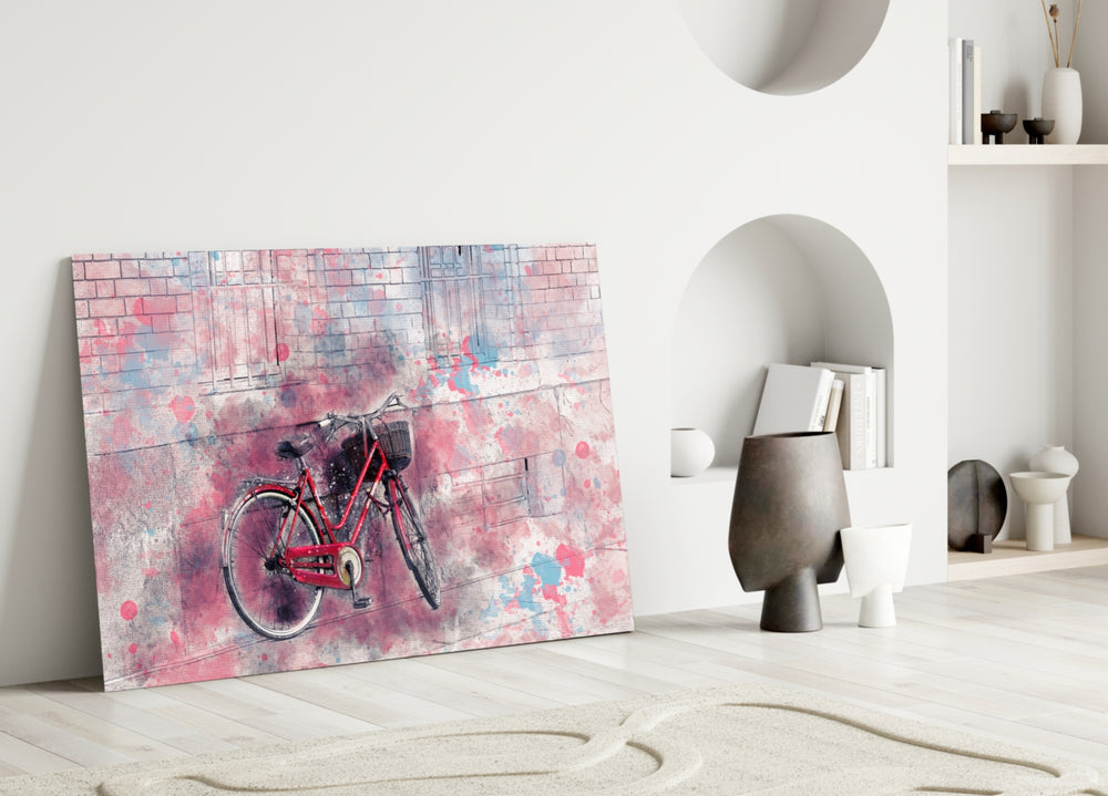 Close-up detail of red bicycle against pink-and-blue watercolor brick wall