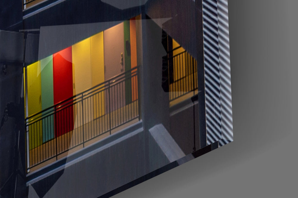 Colored Doors artwork anchoring an urban-themed wall in bold palette