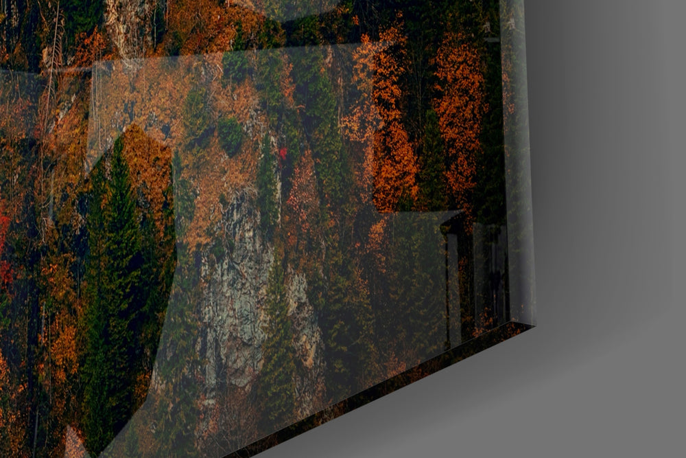 Castle artwork anchoring an alpine-themed wall in warm palette