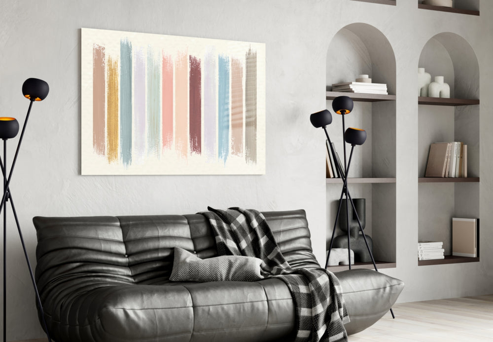 Colored Lines glass wall art styled above a bed in a serene bedroom