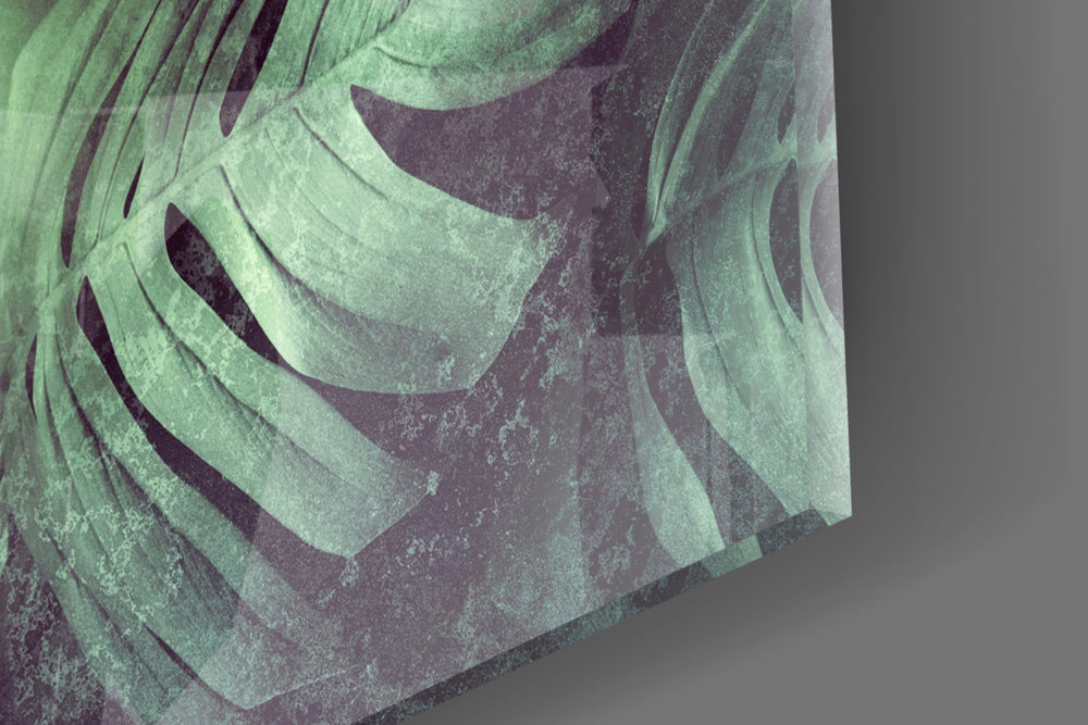 Tropical Leaf and Woman Portrait artwork anchoring a surrealist-themed wall in moody palette