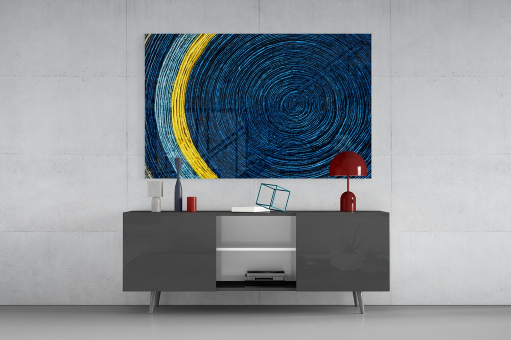 Colored Spiral panel catching daylight to reveal its woven cord