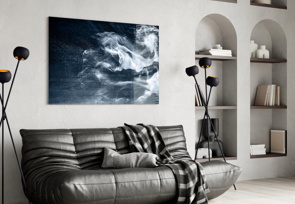 Smoke glass wall art styled above a desk in a contemplative study