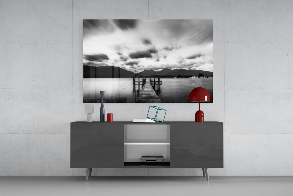 Pier panel catching soft light to reveal its sweeping cloud-motion