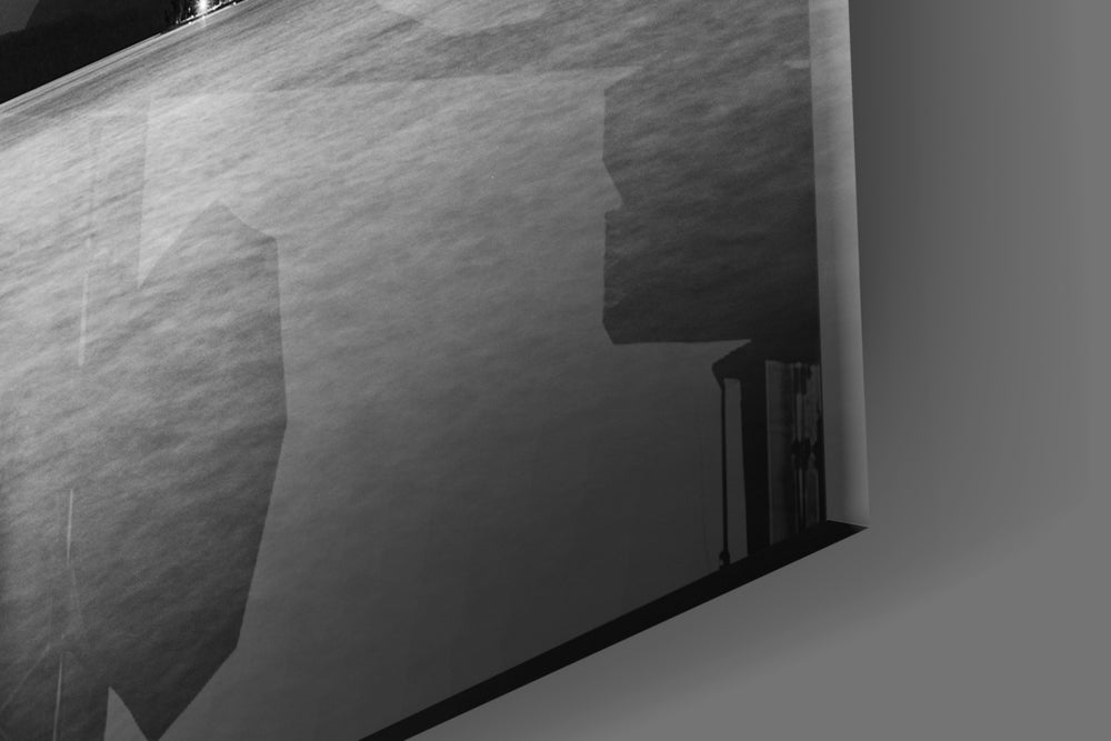 Pier artwork anchoring an alpine-themed wall in monochrome palette