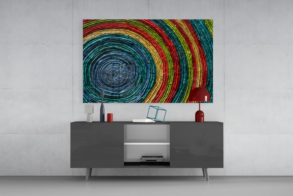 Colored Spiral panel catching daylight to reveal its woven cord