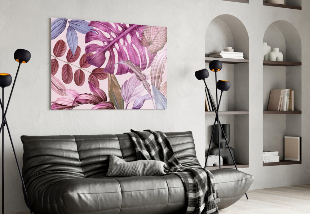 Tropical Leaves glass wall art styled above a bed in an intimate bedroom