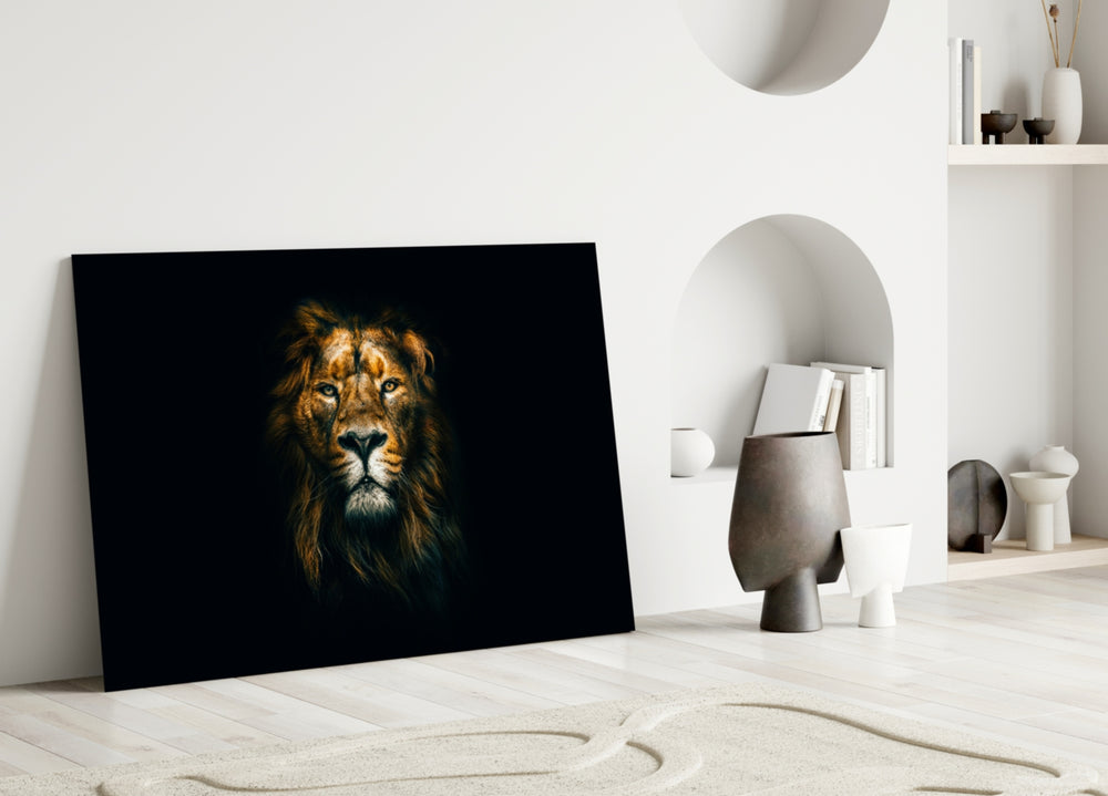 Close-up detail of male lion's golden eyes against rich mane