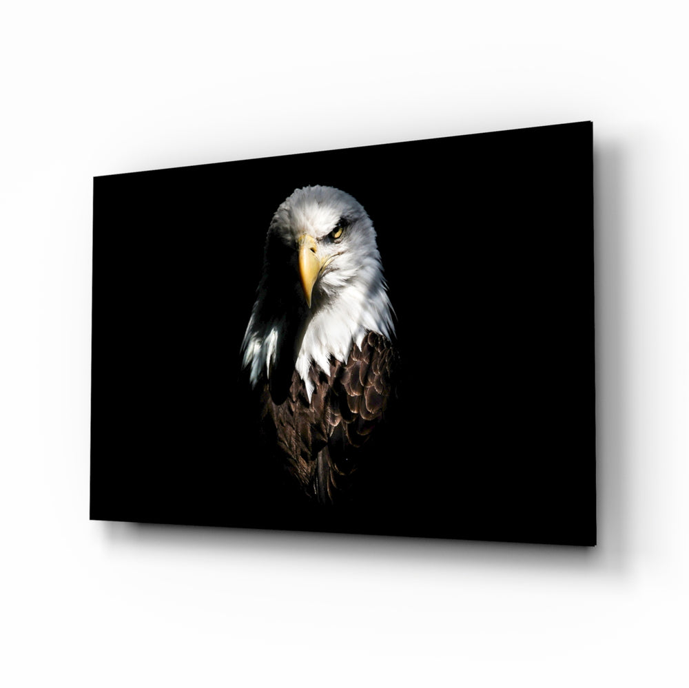 Eagle glass wall art displayed above a console in a designer interior