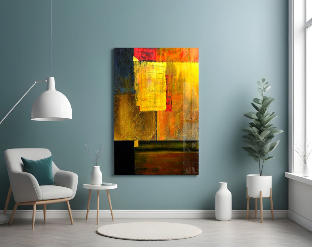 Abstract Colors glass wall art styled above a sofa in a contemporary living room