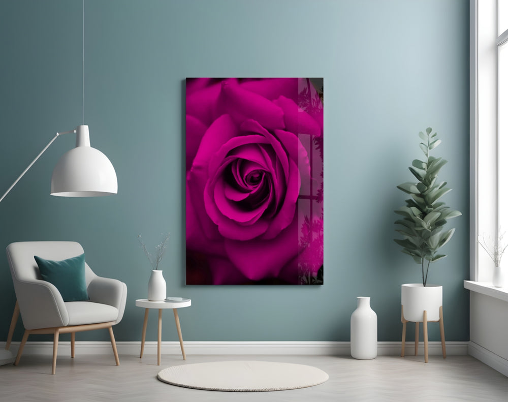 Rose glass wall art styled above a bed in a magenta-mood bedroom