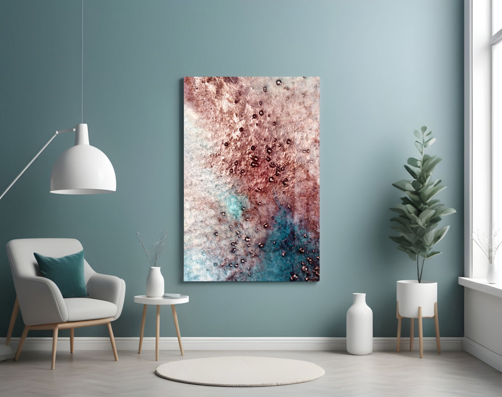 Abstract glass wall art styled above a bed in a jewel-tone bedroom