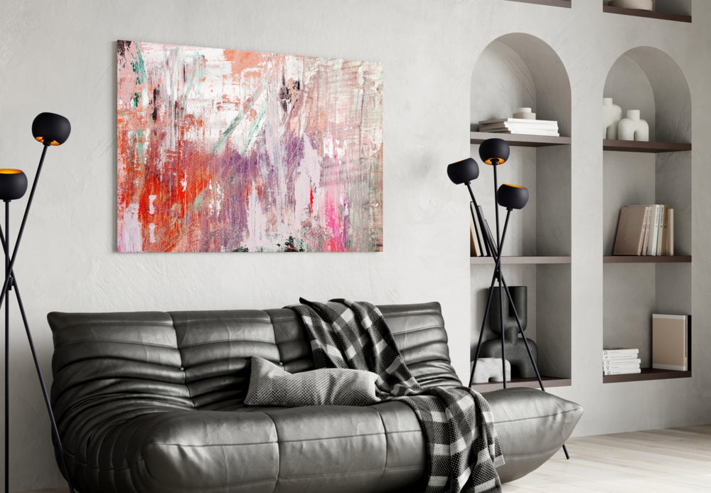 Abstract glass wall art styled above a bed in an intimate bedroom