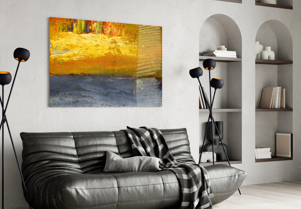 Abstract glass wall art styled above a desk in a reflective study