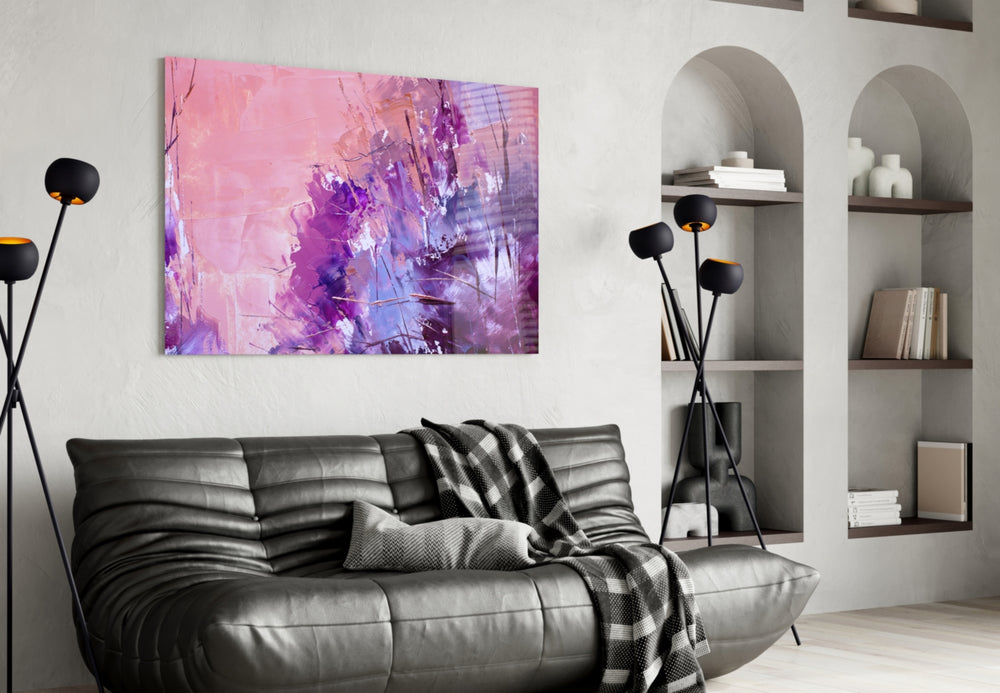 Abstract glass wall art styled above a bed in an intimate bedroom