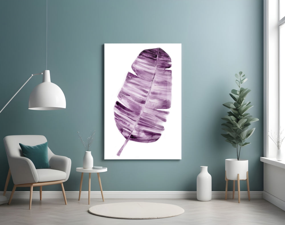 Leaf glass wall art styled above a bed in an intimate bedroom