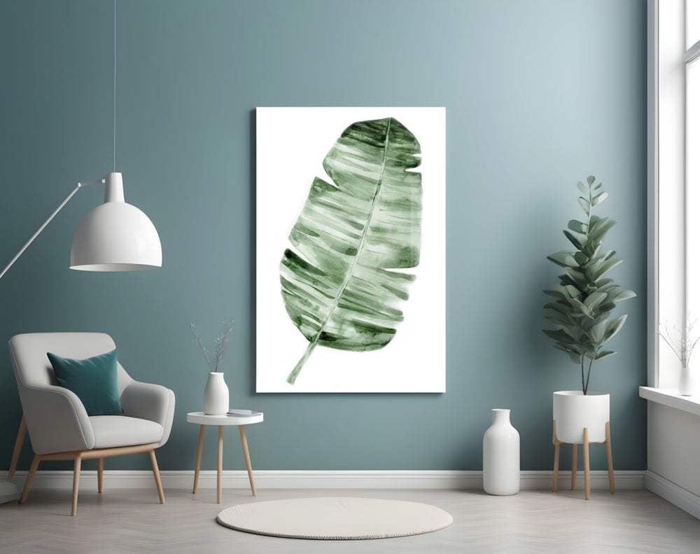 Feather glass wall art styled above a bed in a serene bedroom