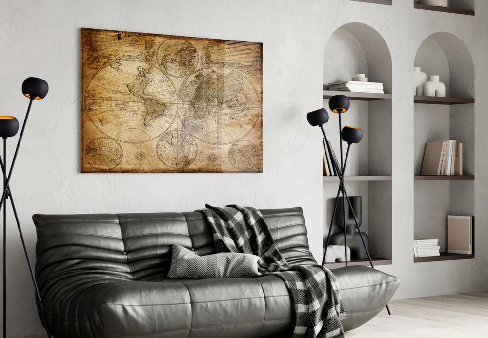 World Map glass wall art styled above a desk in a travel-mood study