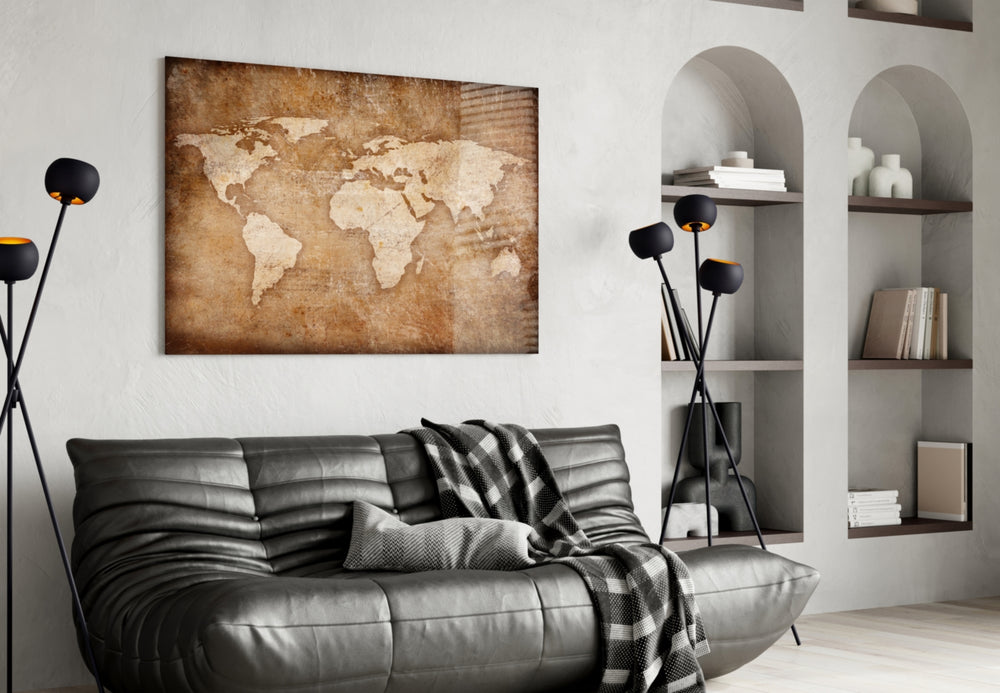 World Map glass wall art styled above a desk in a travel-mood study