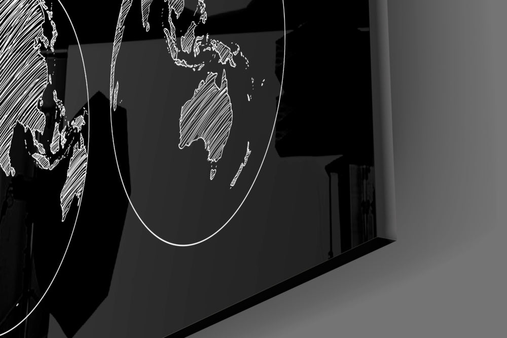 Continents artwork anchoring a contemporary wall in moody palette