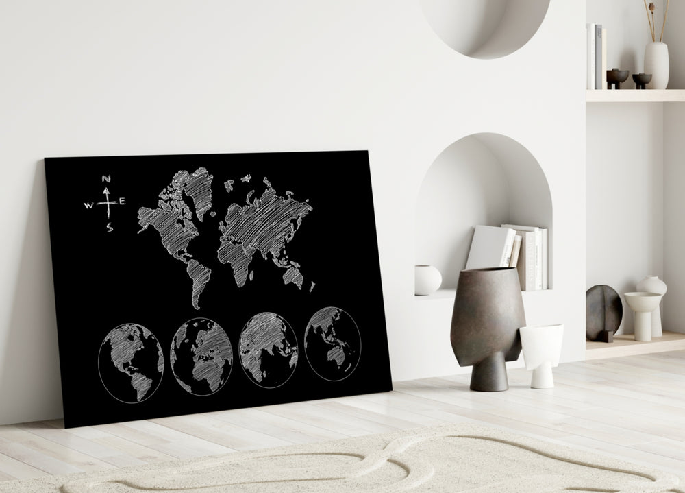 Close-up detail of white sketched continents and hemispheric globes