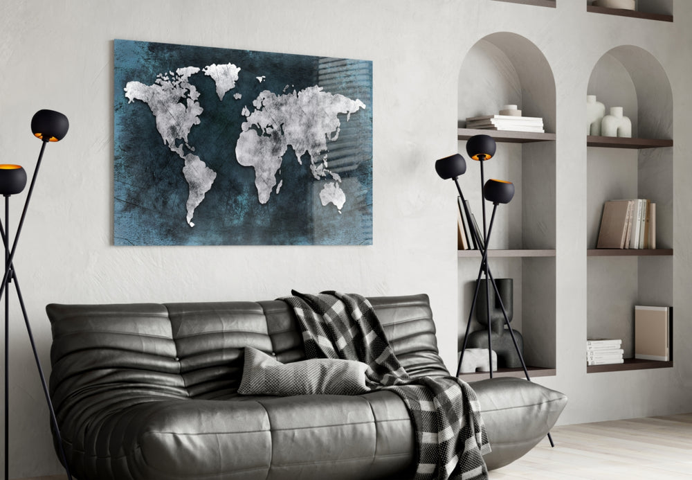 World Map glass wall art styled above a desk in a travel-mood study