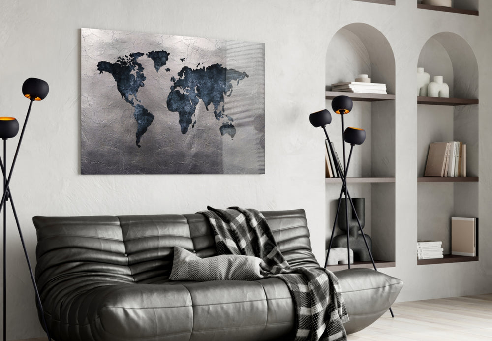 World Map glass wall art styled above a desk in a travel-mood study
