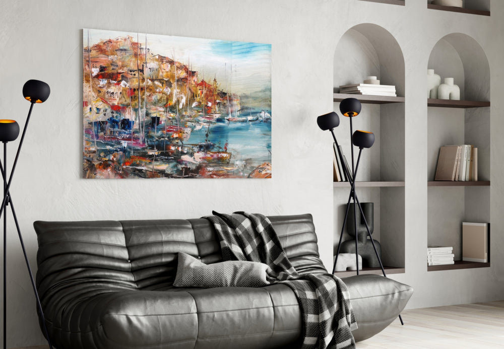 Ships glass wall art styled above a sofa in a Mediterranean-mood living room