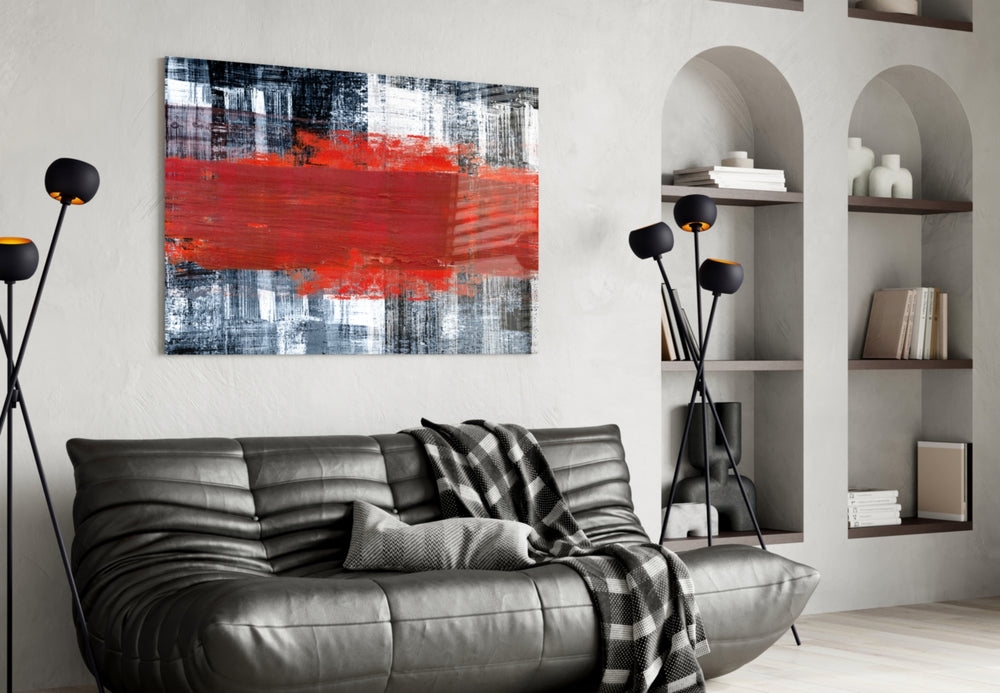 Colors glass wall art styled above a sofa in a downtown loft