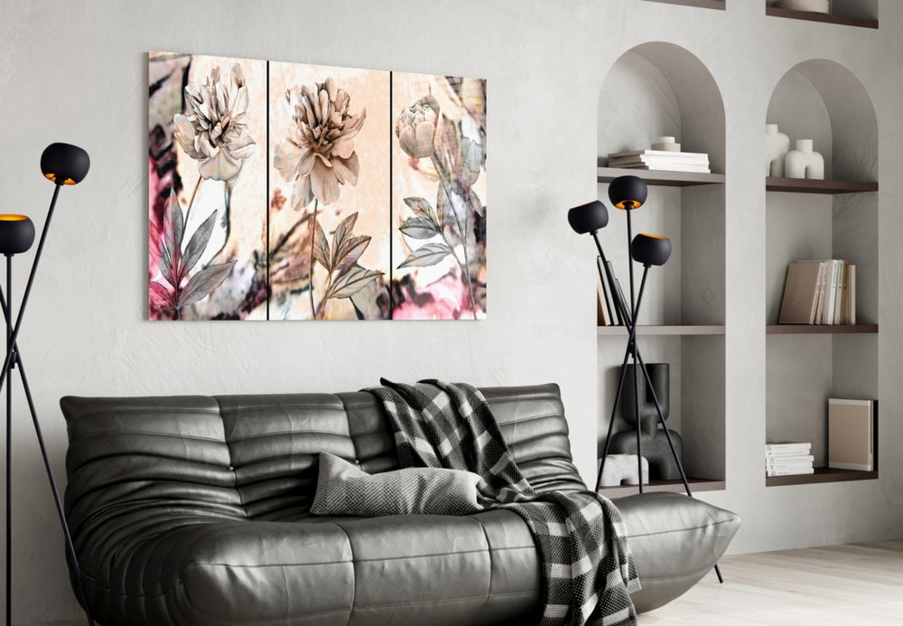 Flowers glass wall art styled above a bed in a serene bedroom