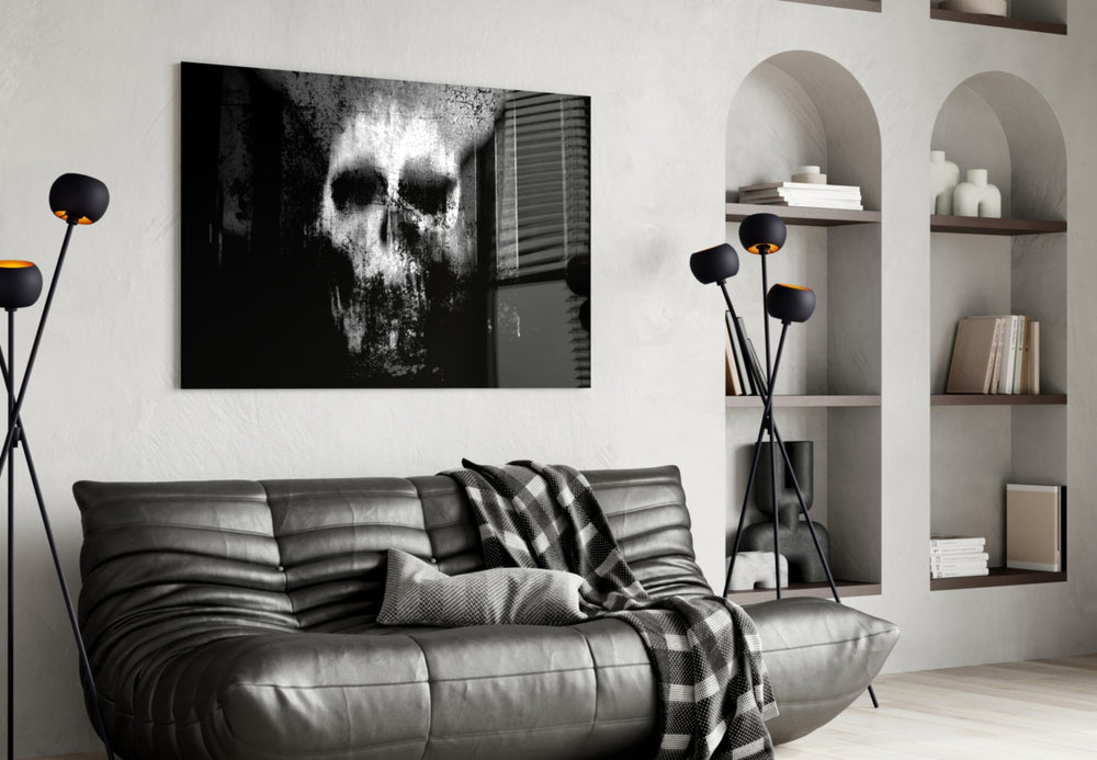 Skull glass wall art styled above a desk in a gothic-mood study