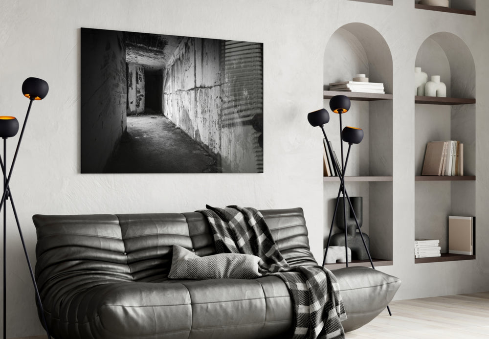 Hallway glass wall art styled above a desk in an introspective study