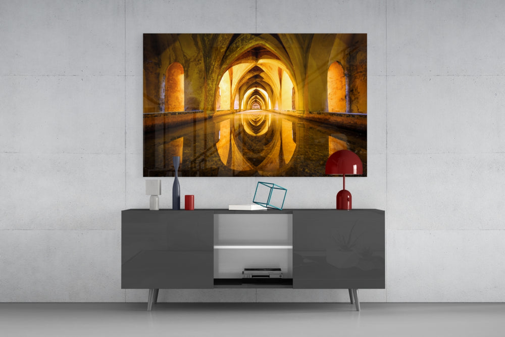 Cistern panel catching low light to reveal its mirrored symmetry