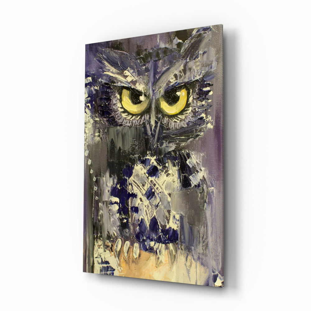 Owl glass wall art displayed above a console in a designer interior
