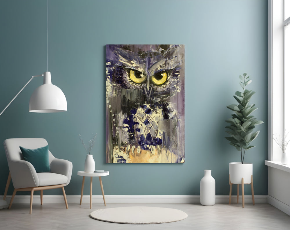 Owl glass wall art styled above a desk in an introspective study