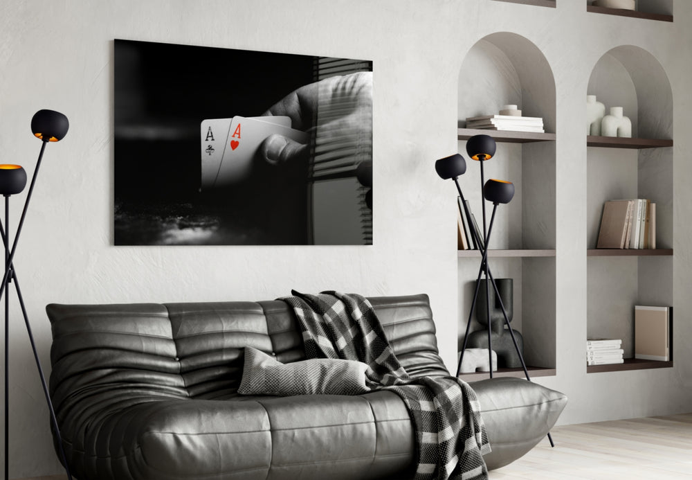 Playing Cards glass wall art styled above a console in a poker man-cave