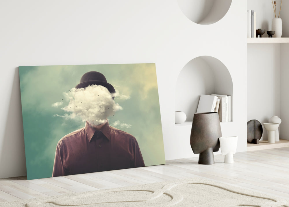Close-up detail of bowler-hatted figure with white cloud face