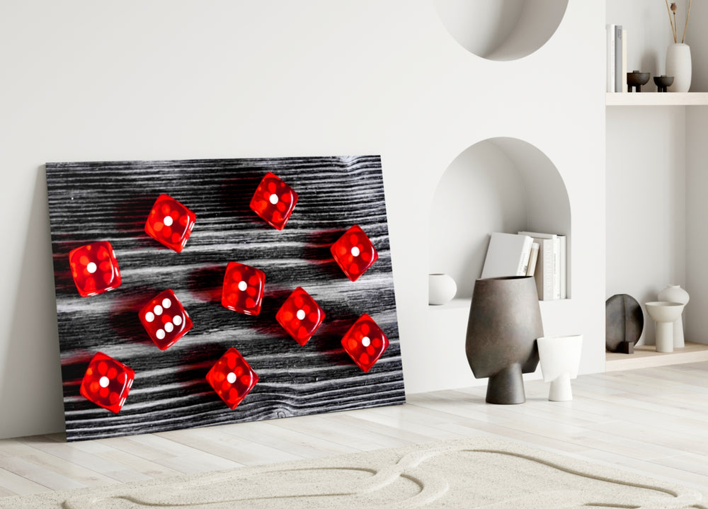 Close-up detail of ruby translucent dice on charred wood plank