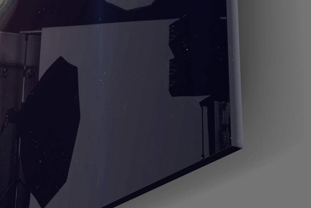 Saturn artwork anchoring a wall with educational palette