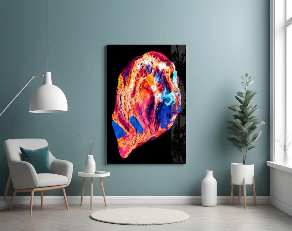 Colored Lava glass wall art styled above a console in a sultry man-cave