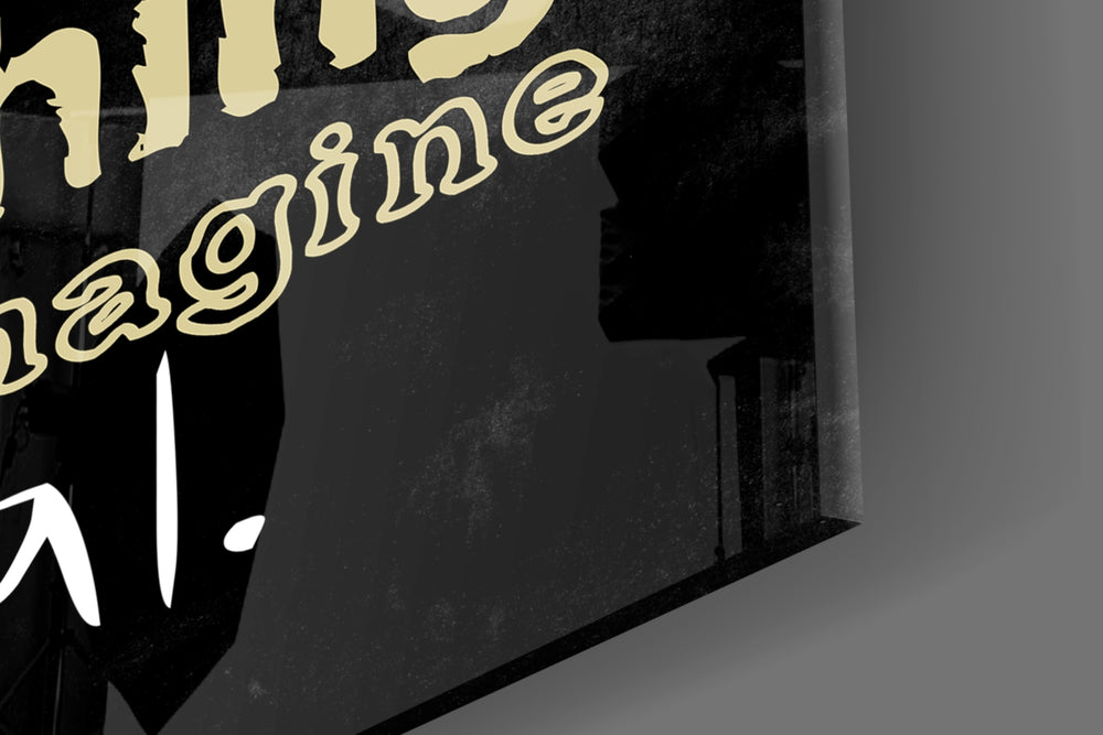 Words artwork anchoring a wall with moody motivational palette