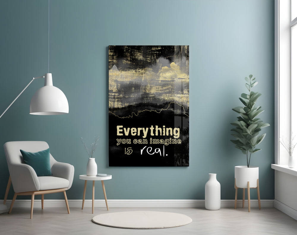Words glass wall art styled above a desk in an executive-mood study