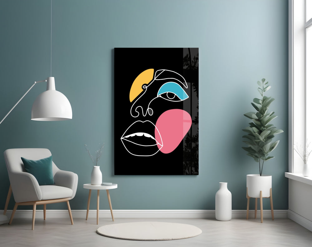 Abstract Colorful Face glass wall art styled above a vanity in a powder room