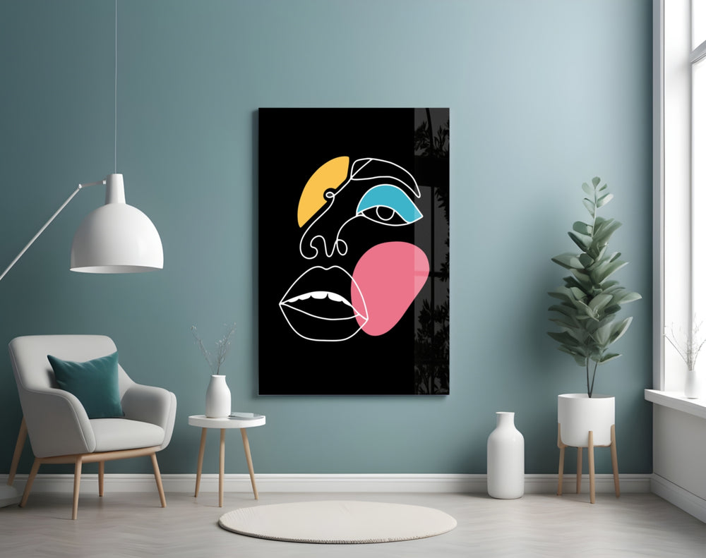 Abstract Colorful Face glass wall art styled above a vanity in a powder room