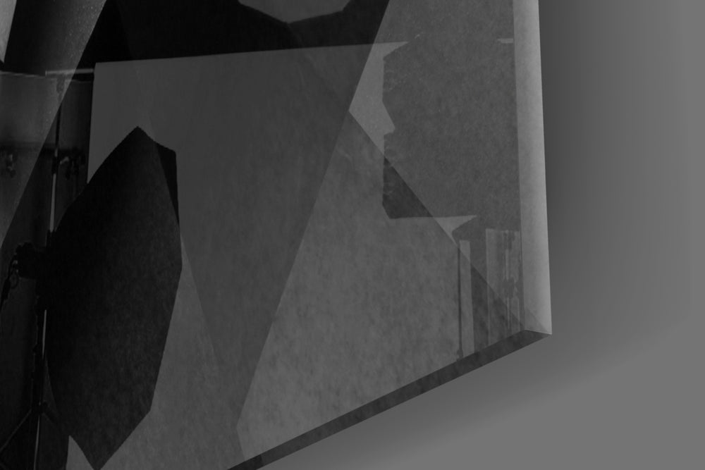 Cold Wall artwork anchoring a wall with moody architectural palette