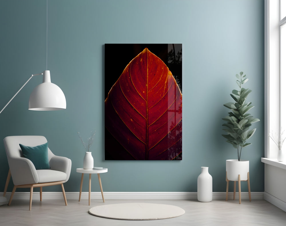 Red Leaf glass wall art styled above a desk in an introspective study